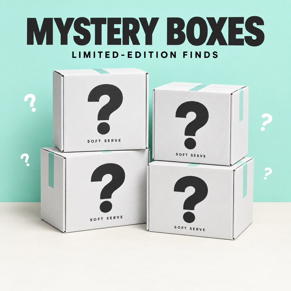 Illustrated white Soft Serve mystery boxes on a mint background