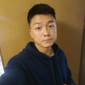 Jooho wearing a Cloud Cotton Hoodie